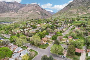 Aerial view of residential area with a mountainous background