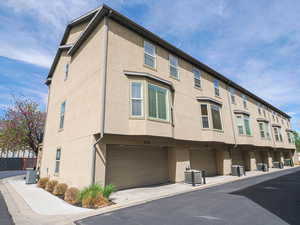 Exterior space featuring an attached garage