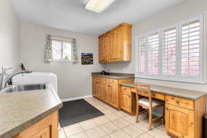 Large main floor laundry area with built in storage