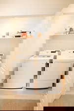 Laundry area with separate washer and dryer