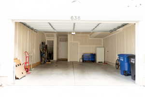 Garage with freestanding refrigerator