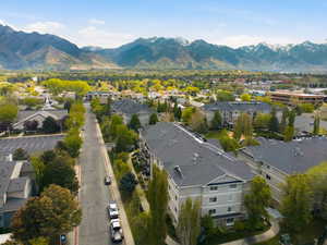 Aerial perspective of suburban area with a mountain backdrop