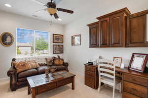 Office area featuring ceiling fan, light carpet, and recessed lighting