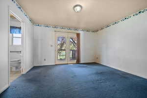 Primary bedroom with en-suite and walkout
