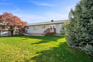 Back of property featuring a patio