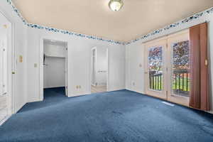 Primary bedroom with walk in closet