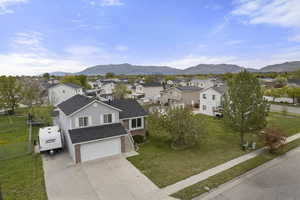 Aerial perspective of suburban area featuring mountains