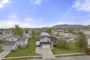 Aerial perspective of suburban area with mountains