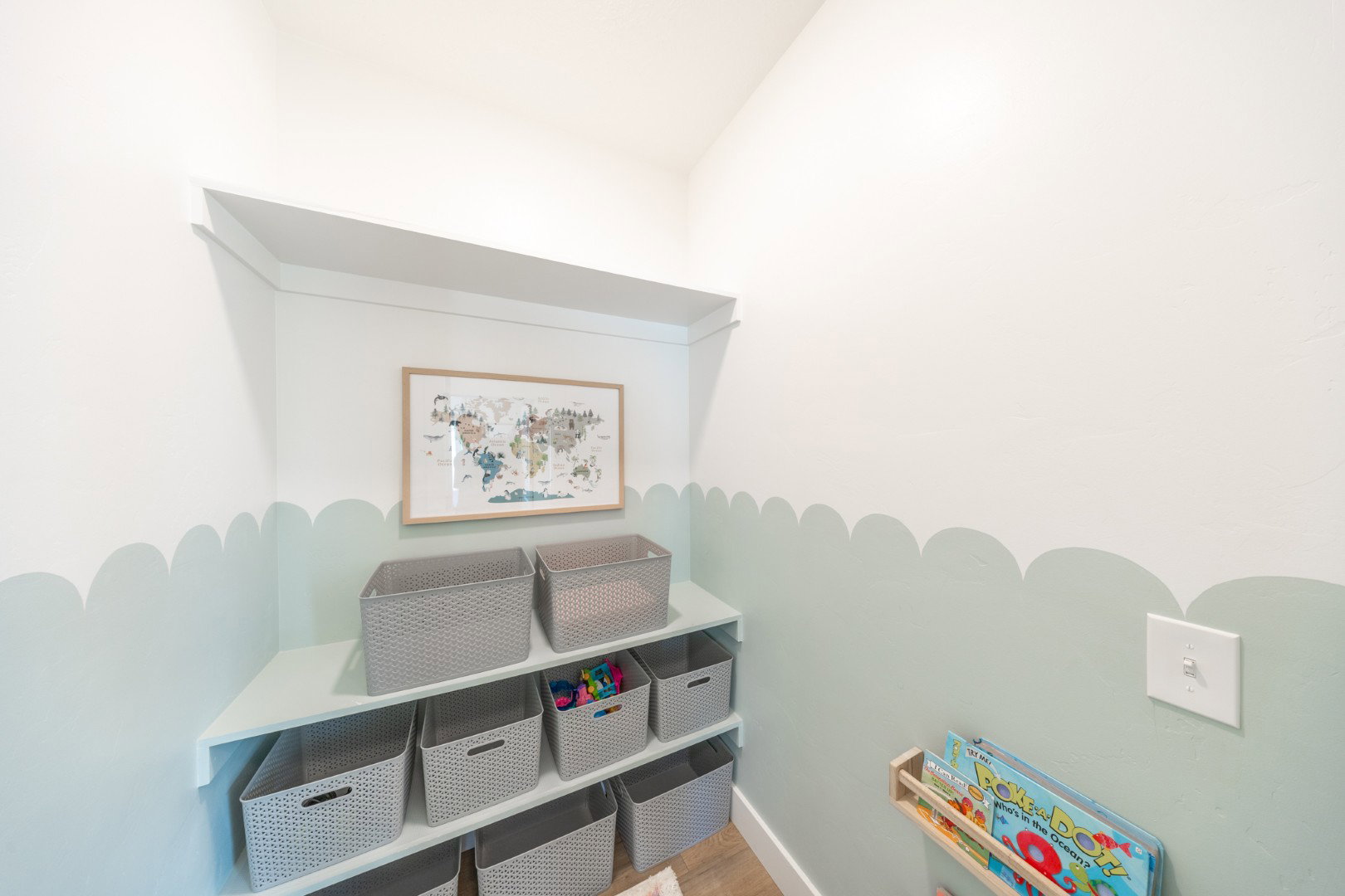 Game room featuring baseboards and wood finished floors