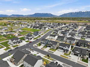 Aerial view of residential area with a mountain backdrop