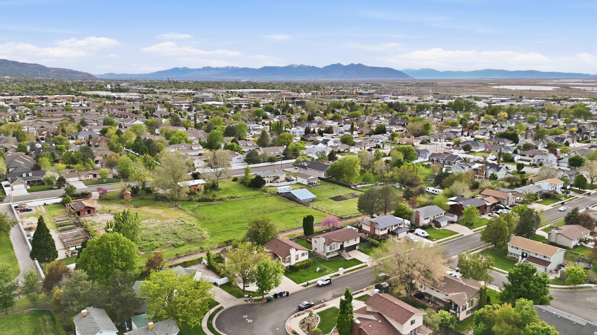Aerial view of residential area with mountains
