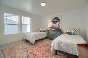 Bedroom featuring baseboards