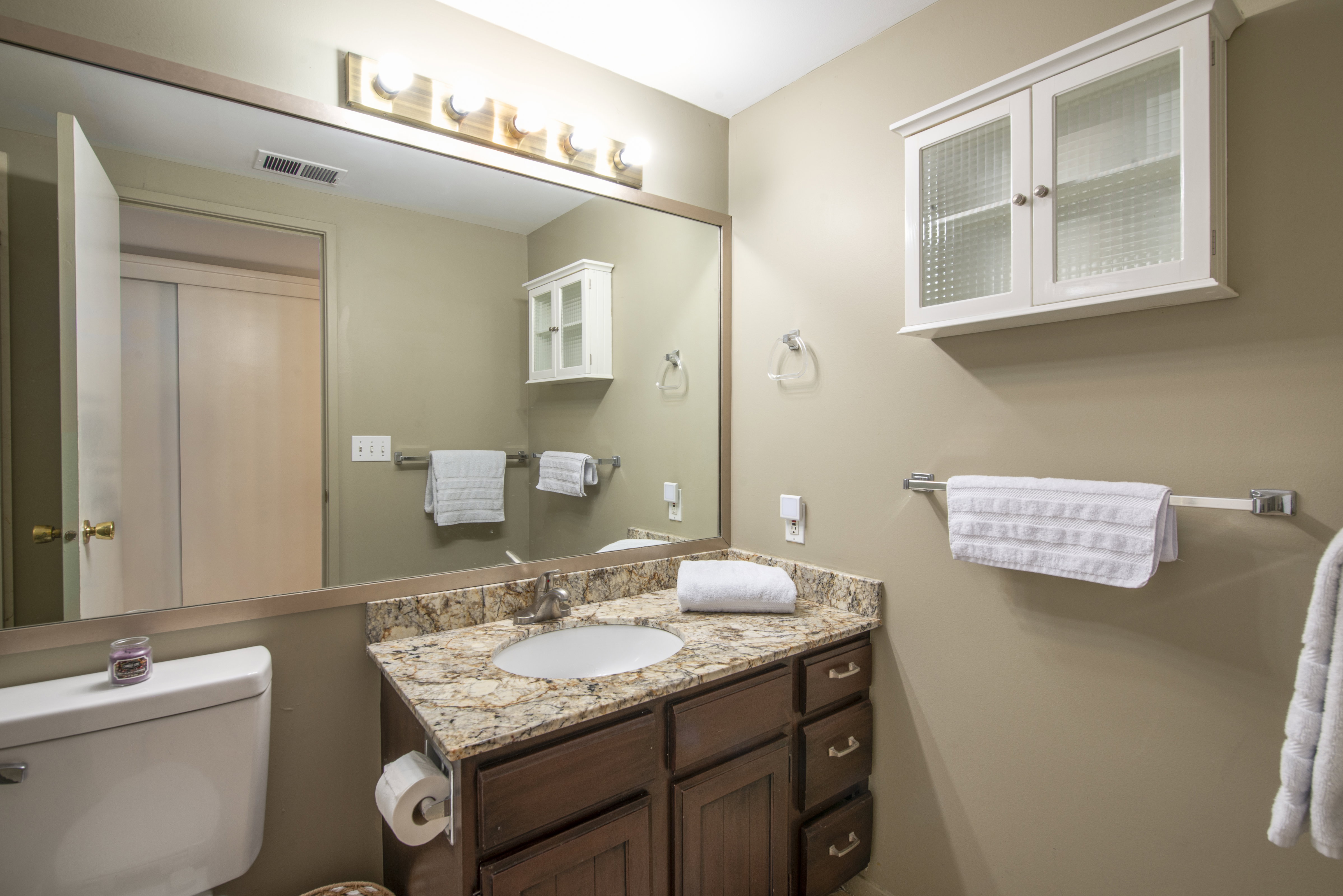 Half bath with vanity and toilet