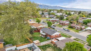 Aerial view of residential area with a mountain backdrop