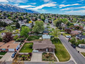 Aerial view of residential area featuring a mountain backdrop