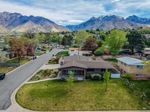 View of mountain backdrop with nearby suburban area