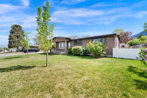 View of front of house with a mountain view