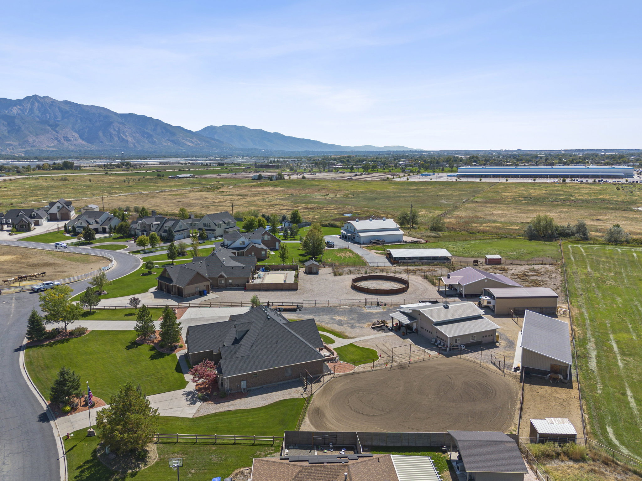 Aerial view of residential area featuring a mountain backdrop