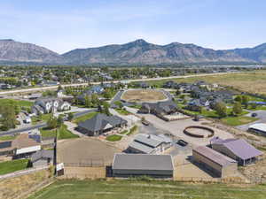 Aerial perspective of suburban area with a mountainous background