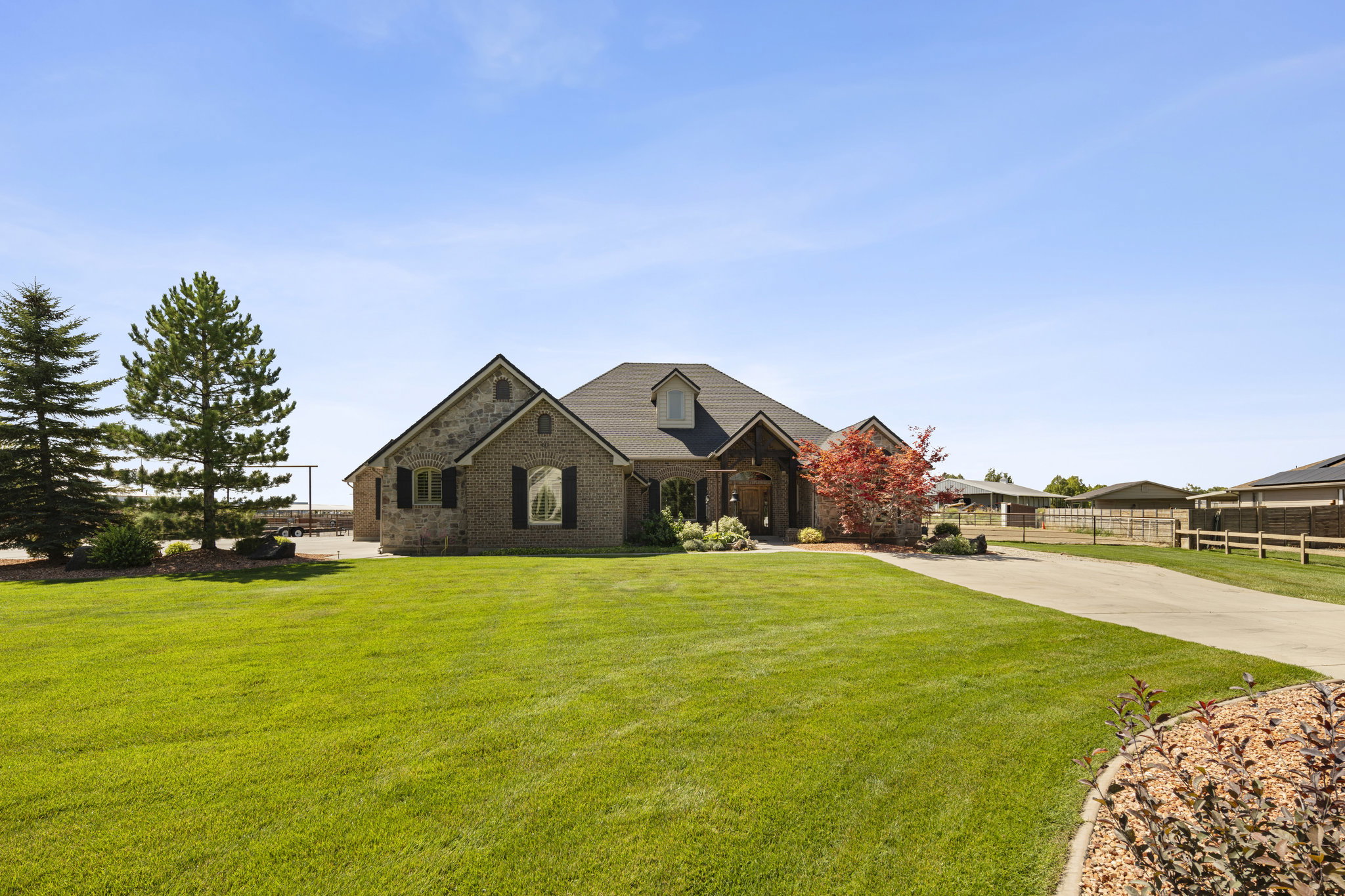 View of front of house featuring brick siding