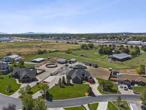 Aerial perspective of suburban area featuring a mountainous background