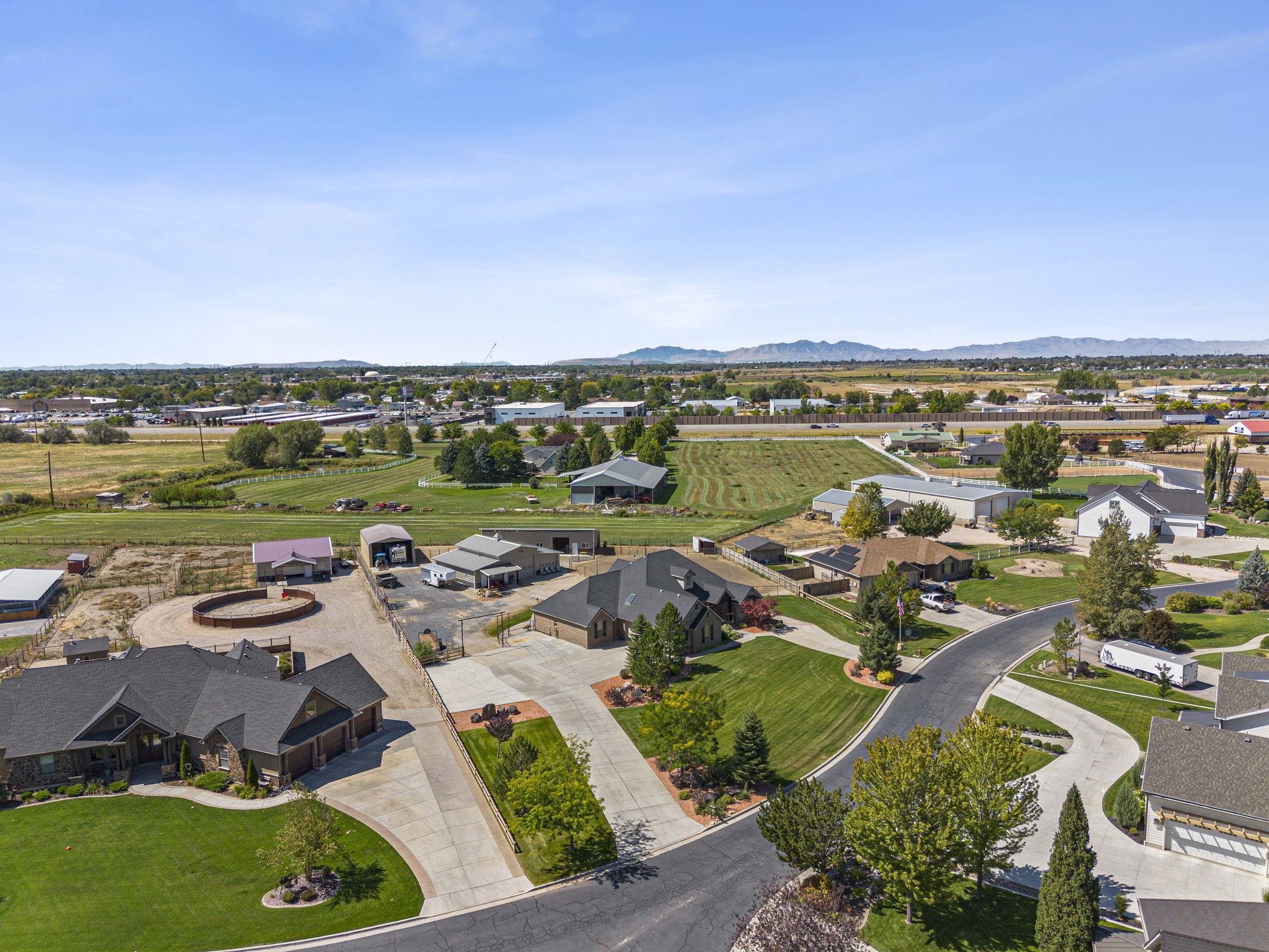 Aerial perspective of suburban area with mountains