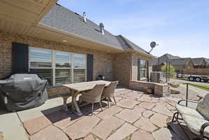 View of patio / terrace with outdoor dining area and grilling area