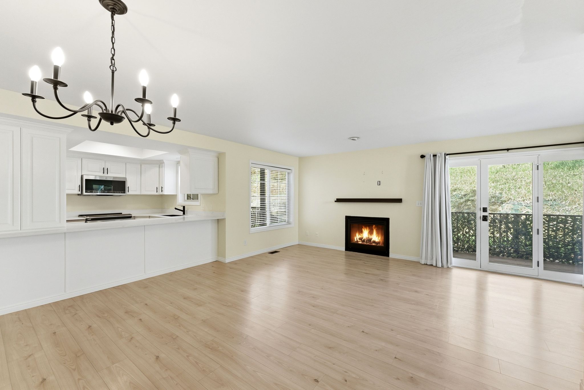 Open living and dining area with a bright, connected layout