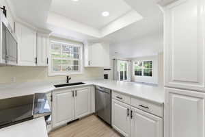 Kitchen recess lighting, large counter space, and stainless steel electric range in swiss oaks community
