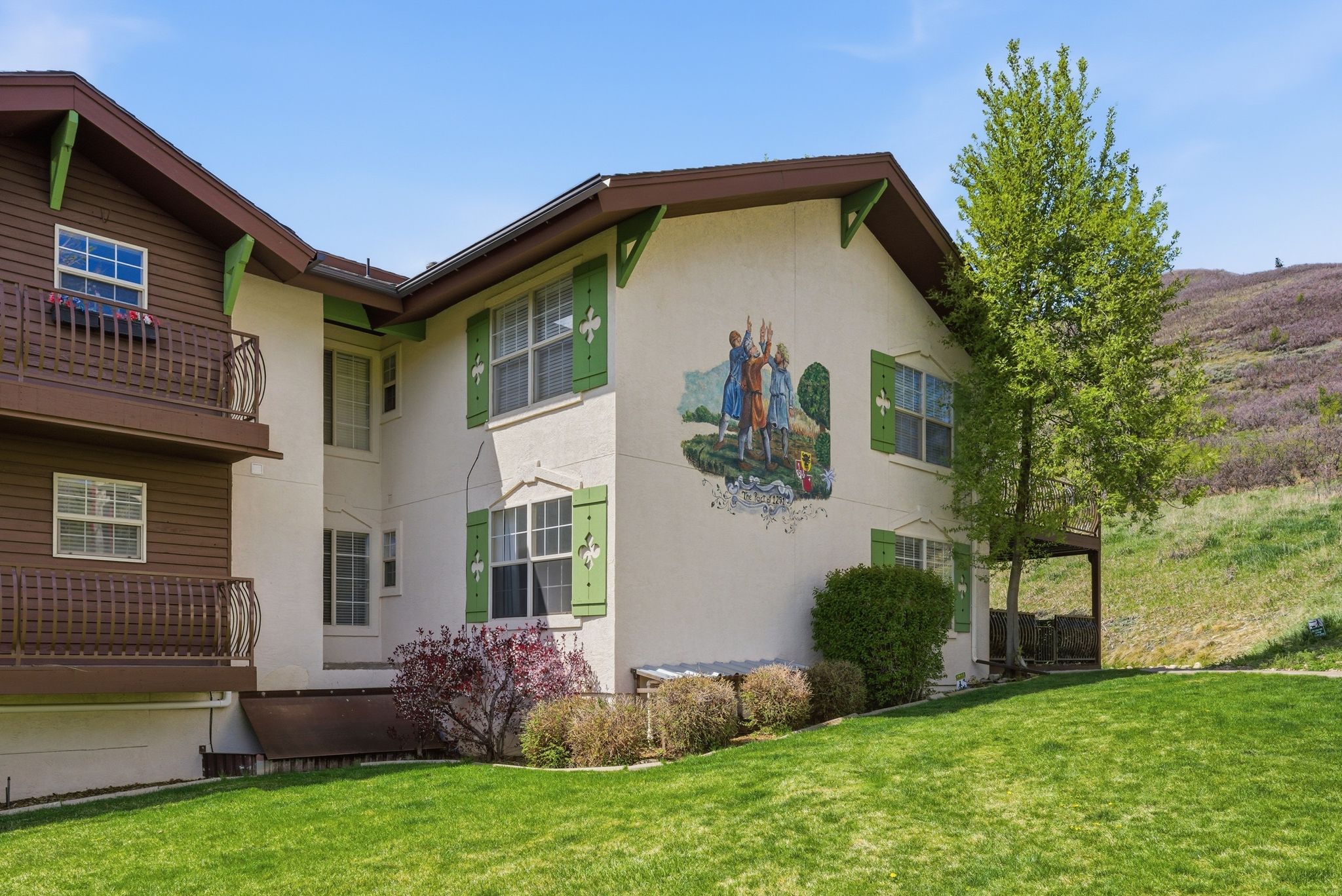 Exterior view highlighting the building’s design details and well-maintained grounds within the community.