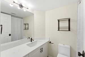 Clean finishes and updated fixtures create a polished, easy-to-maintain bathroom space.