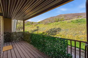 Ground-level patio in Midway condo for sale with direct access to walking trails and landscaped open space.