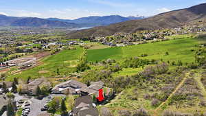 Wide-angle perspective capturing the mountain setting and open surroundings.