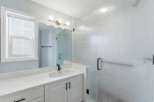 A private ensuite bathroom connected to the primary bedroom for added convenience and everyday functionality.