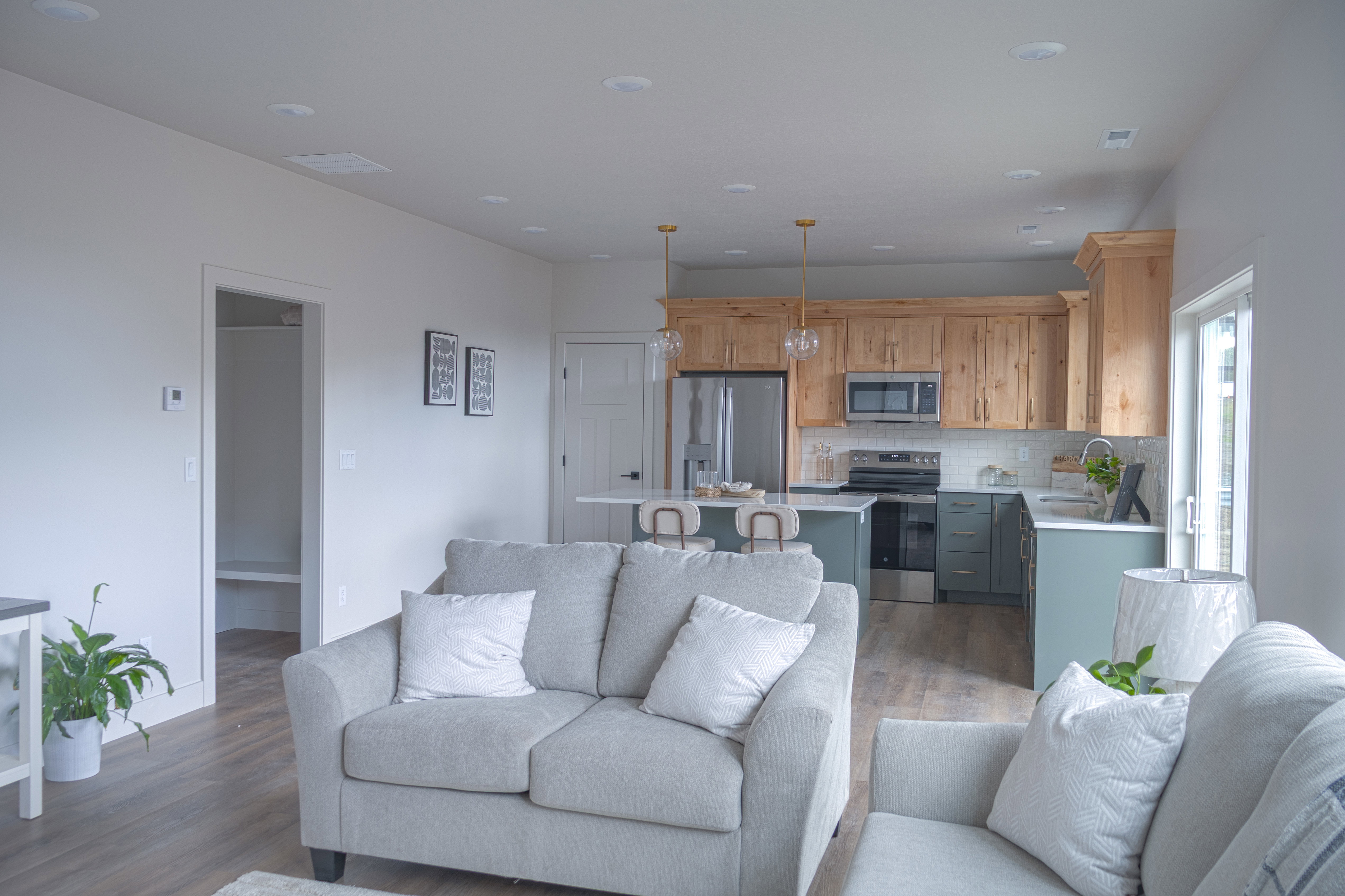 Living room featuring dark wood finished floors and recessed lighting