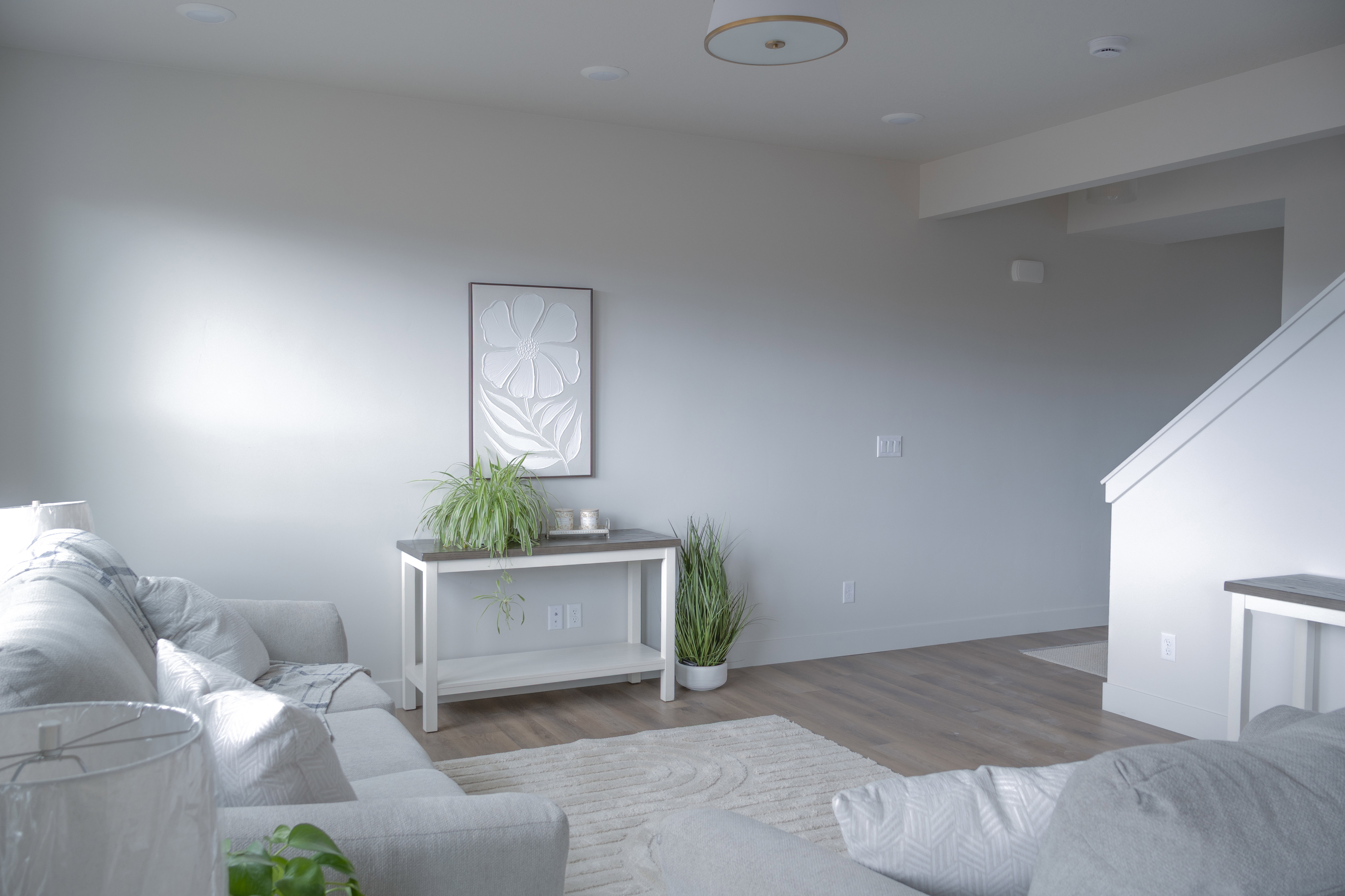 Living room with wood finished floors and baseboards