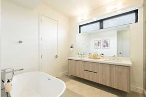 Bathroom with a soaking tub and double vanity