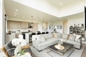 Living area featuring recessed lighting and light wood finished floors