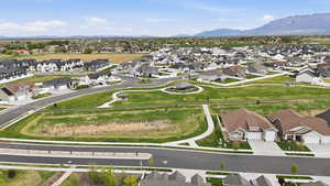 Aerial view of residential area with a mountainous background