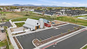 Aerial perspective of suburban area with a mountain backdrop