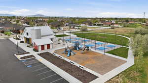 Aerial perspective of suburban area with a mountain backdrop