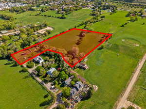Aerial view of property's location featuring property parcel outlined