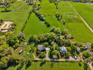 Overview of rural landscape featuring a pastoral area