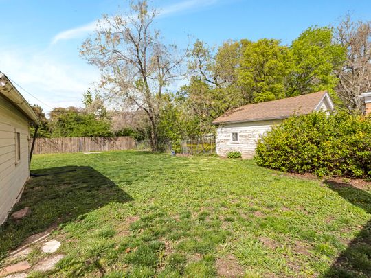 View of fenced backyard