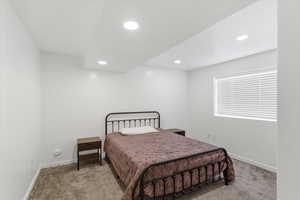 Bedroom featuring carpet floors and recessed lighting