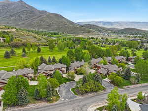 Aerial perspective of suburban area featuring mountains