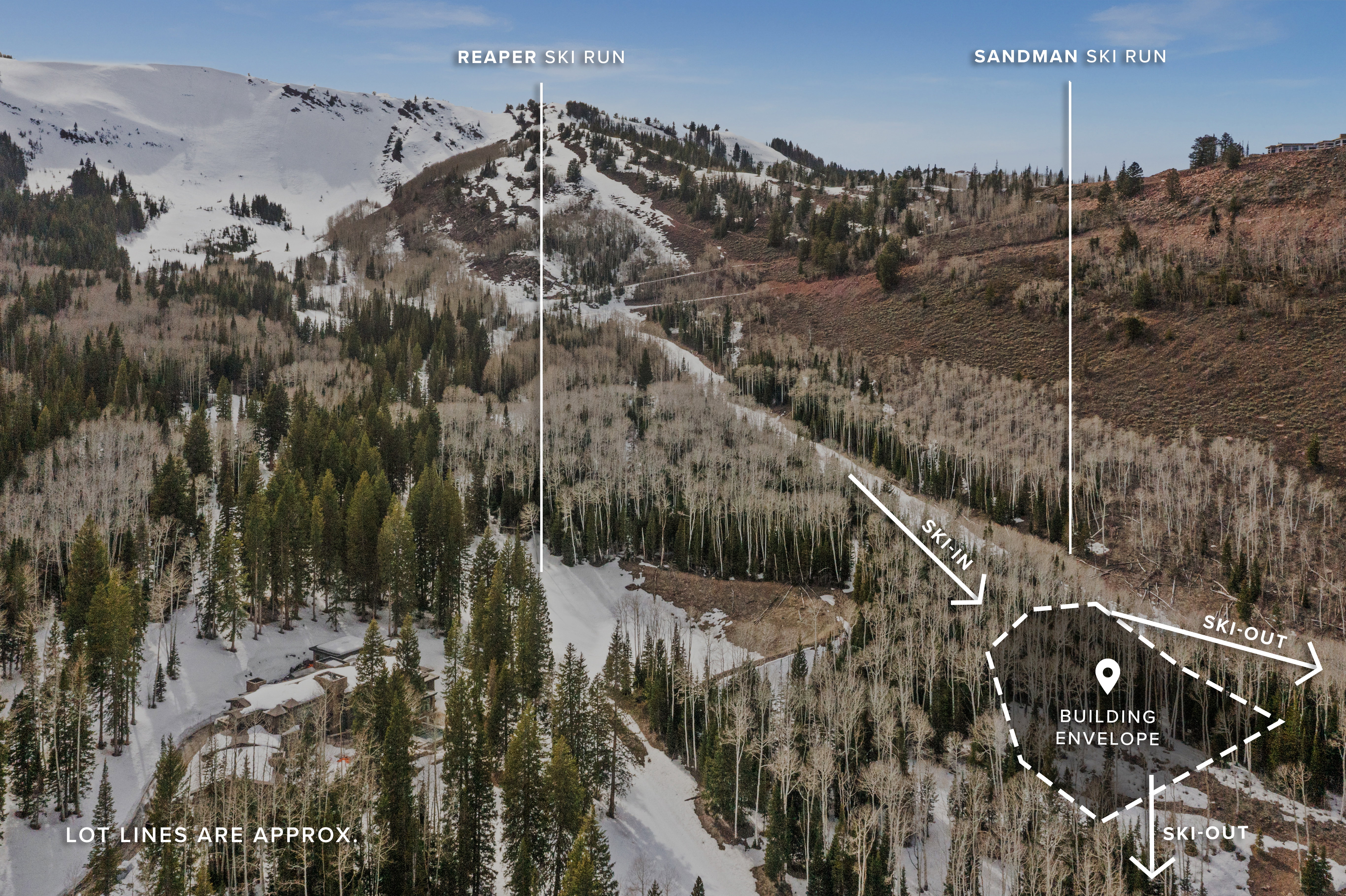 Aerial view of property and surrounding area featuring a mountainous background and property parcel outlined