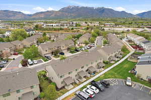 Aerial view of residential area featuring a mountain backdrop