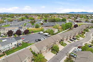 Aerial view of residential area featuring mountains