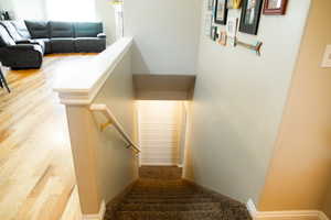 Staircase with wood finished floors